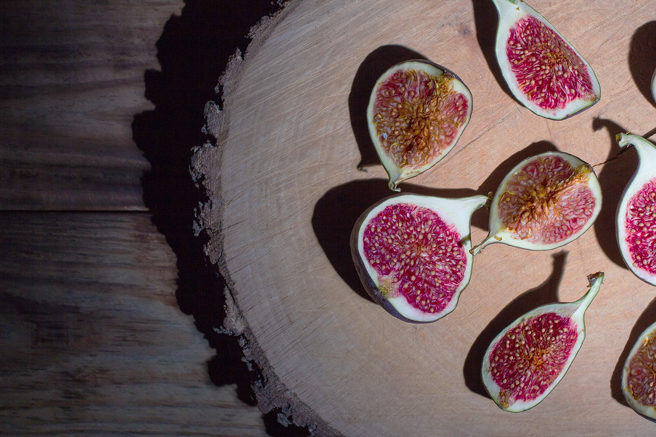 Figs on a wooden table in retro style