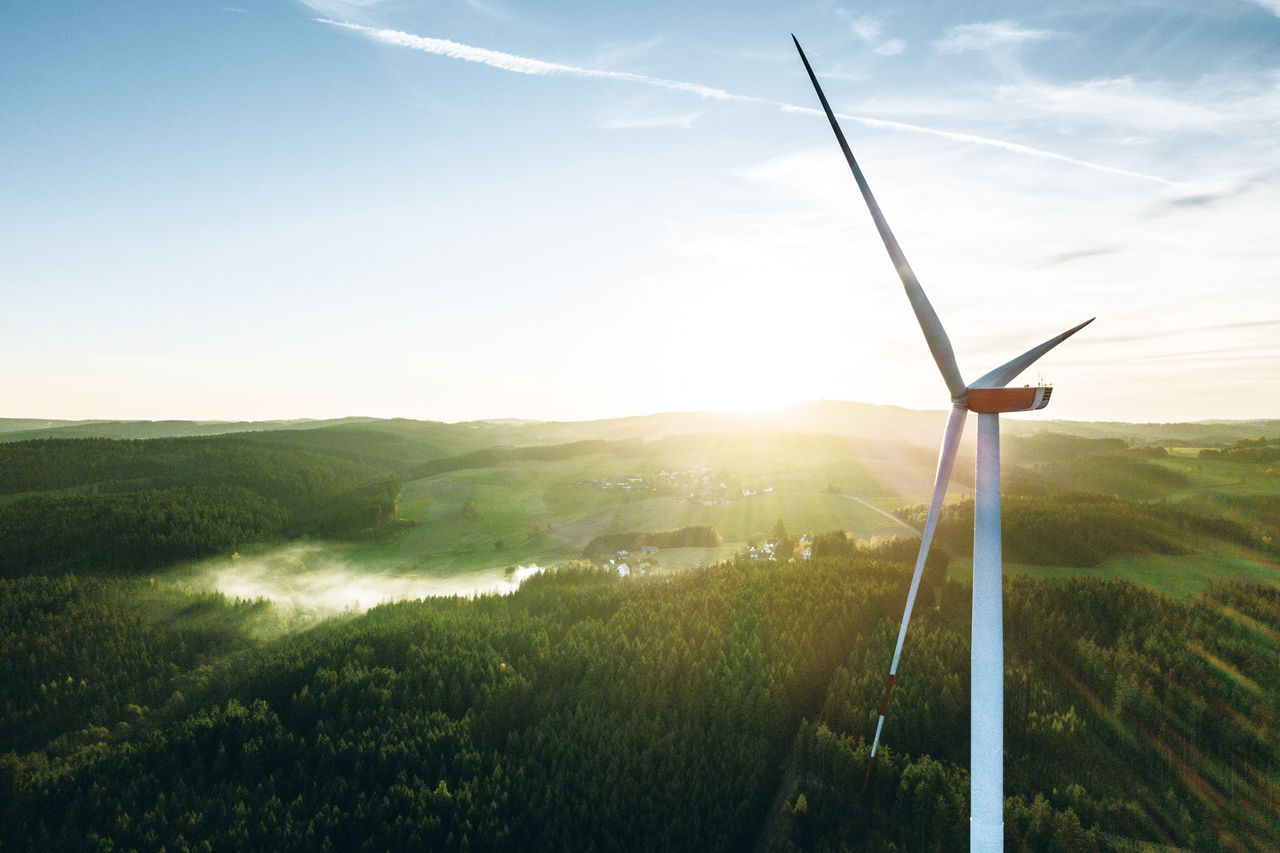 Wind Turbine in the sunset seen from an aerial view